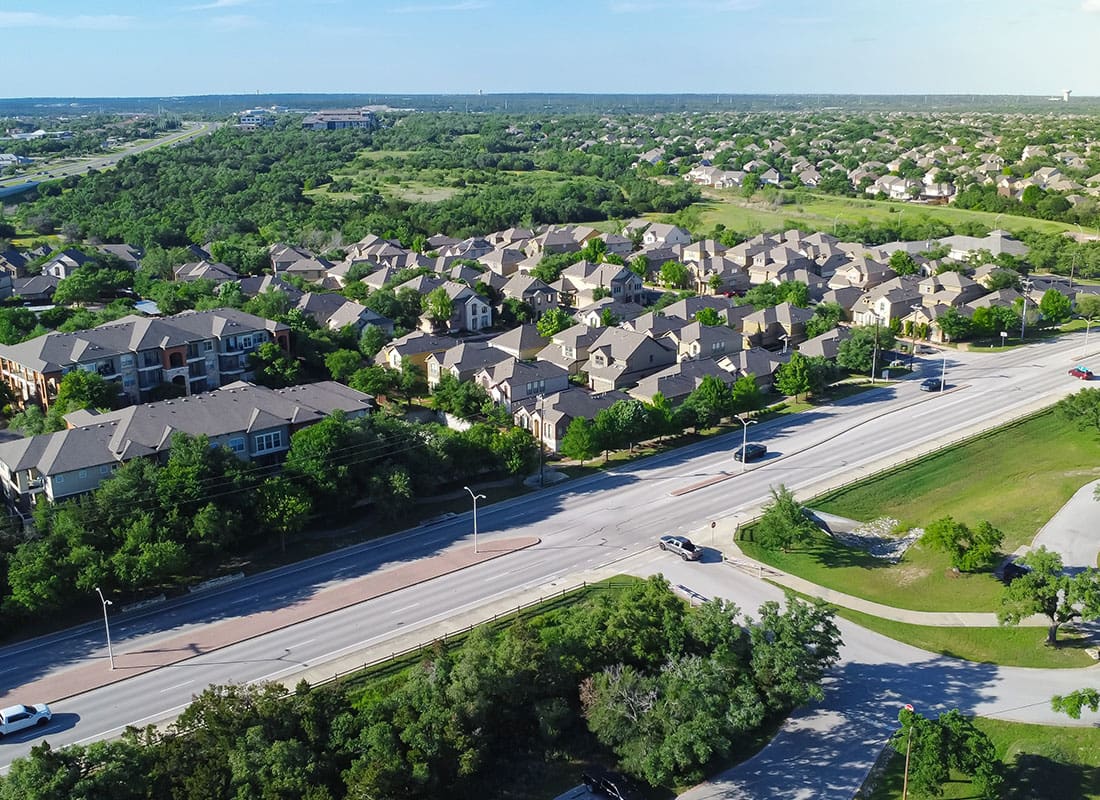 Cedar Park, TX - Aerial View of Residential Homes on a Sunny Day